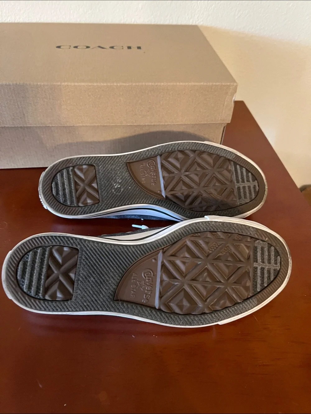 Converse slip on blue jean colored All Stars.  Size 6
